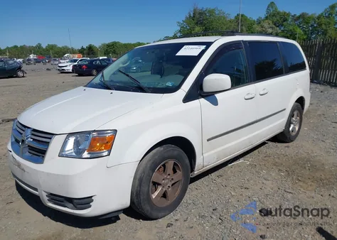 2010 Dodge Grand Caravan Sxt z USA, uszkodzony, nr VIN 2D4RN5D12AR210330
